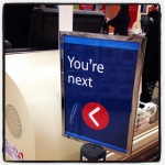 Tesco also have a rather sinisterly threatening approach to queue control.
